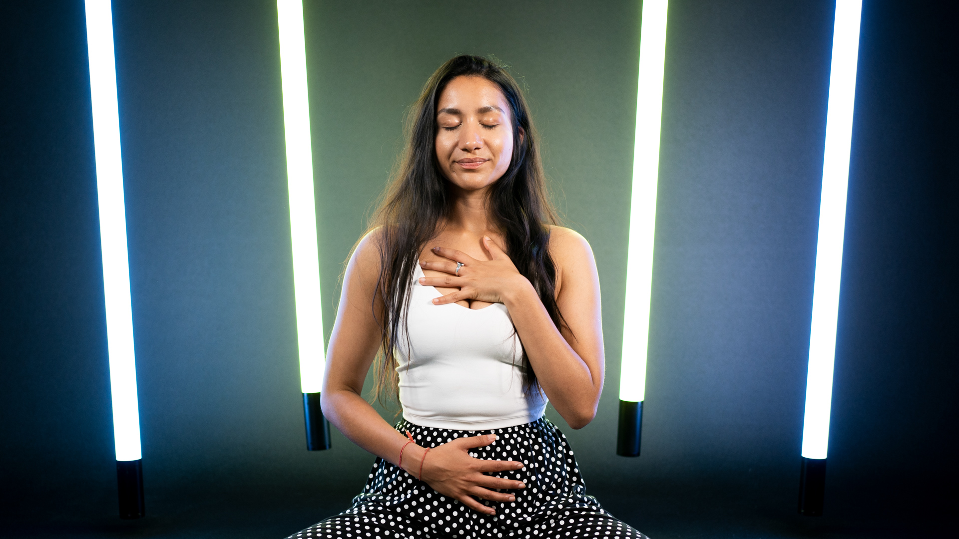 Angie Tiwari meditating in the studio
